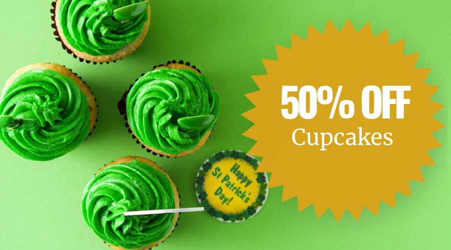 Festively decorated St pat's cupcakes with a big 50% off promo star