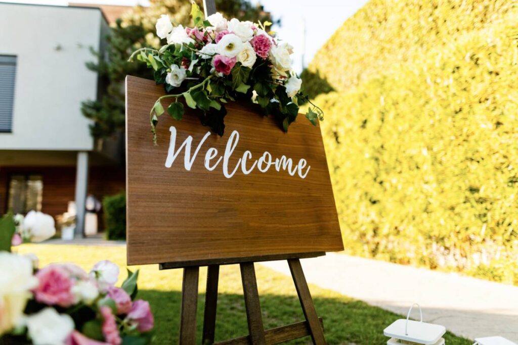 Welcome sign for an outdoor wedding reception